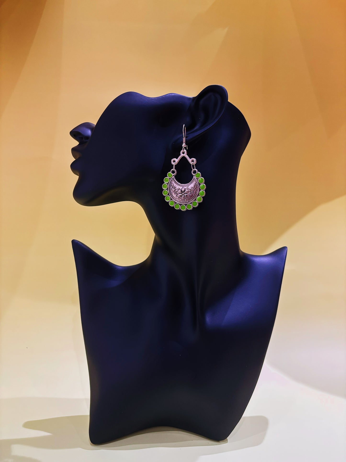 Green dangle earring